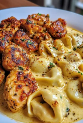 Velvety Cajun Chicken Tortellini with Three-Cheese Sauce
