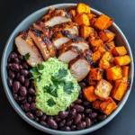 Chipotle Chicken Bowl with Black Beans, Sweet Potatoes, and Cilantro Lime Sauce