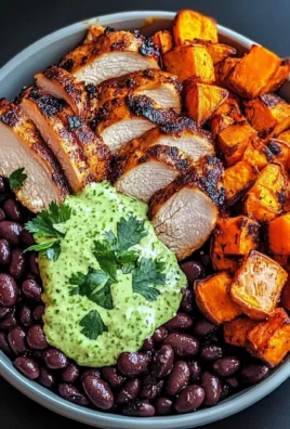 Chipotle Chicken Bowl with Black Beans, Sweet Potatoes, and Cilantro Lime Sauce